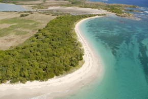 Bungalow d'une chambre avec vue sur la mer piscine partagee et jardin clos a Sainte Anne a 1 km de la plage